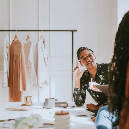 Young female designer in a boutique